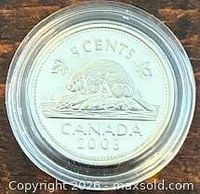Reverse view of 2003 Canadian 5 cents silver proof coin in capsule
