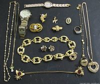 Full lot overview displaying all jewellery and watches