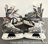 Three pairs of skates side view showing condition and design