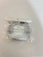 Front view of sealed magnetic tape roll with Italian packaging text