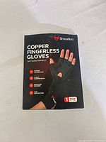 Front of BraceBull Copper Fingerless Gloves retail box