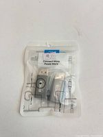 Front of sealed JSAUX two-pack adapter pouch