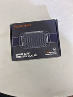 Retail box front displaying PEACHAR Smart Bark Control Collar branding