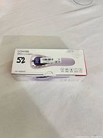 Closed retail box showing model and color