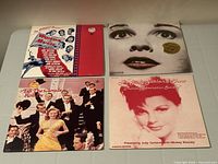 Front jackets of all four LPs