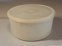 Side view of Tupperware container with lid in place