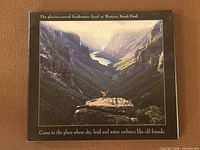 Front of gatefold sleeve showing landscape image and title text