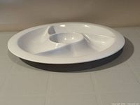 Angled top view of white segmented tray