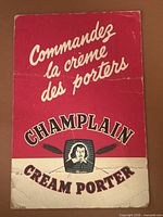 Front view of Champlain Cream Porter cardboard sign showing full graphics and wear