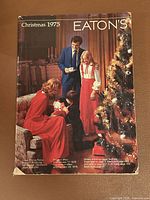 Front cover showing family and tree, confirms title and year