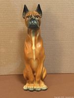 front view of ceramic boxer dog figurine