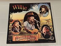 Front jacket showing album art and title