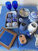 All items displayed on blue cloth