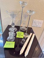 All items grouped: three pairs of candle holders and two tapers
