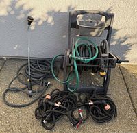 Full view of hose reel cart, hoses, and spray wand