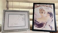 Both framed artworks side by side