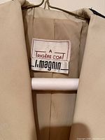 Label showing Trigère Coat for I. Magnin