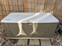 Closed Rubbermaid deck box front view