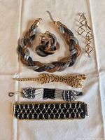All six jewelry pieces laid out for overview
