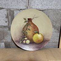 Full view of bamboo plate showing painted still life and overall condition