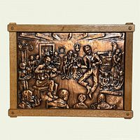 full view of framed embossed metal plaque