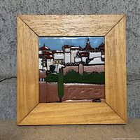 Front view of framed ceramic tile plaque