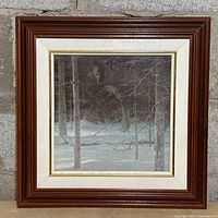 Front view showing framed print, mats, and wood frame