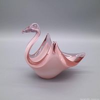Front/side view of entire pink glass swan figurine