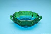 Oblique front view showing overall shape, handles, and color gradation