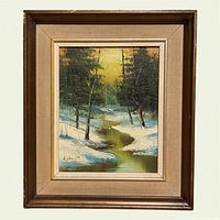 Front view of framed winter landscape painting