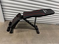Side view of Flybird adjustable weight bench in inclined position