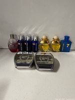 Group shot of all ten perfume bottles