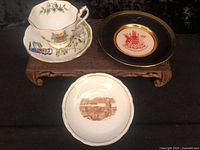 Lot overview showing cup on saucer plus two additional saucers
