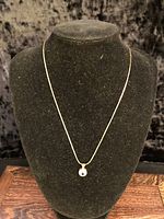 full necklace on display bust