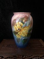 Front view showing floral artwork and colour gradient