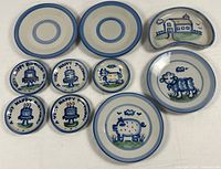 Front view of all ten M.A. Hadley plates showing motifs and sizes