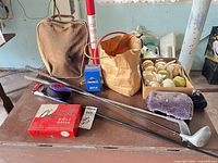 Full lot overview showing clubs, bag, balls and accessories