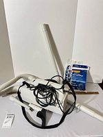 Vacuum with hose, wands, strap, replacement bags grouped