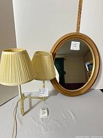 Mirror and lamp front view showing dimensions tags