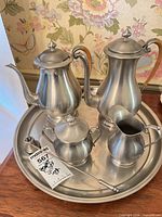 Full tea/coffee service on tray showing all pieces