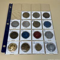 Full view of binder sleeve with 20 AA tokens in flips