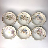 Six scallop dishes front view on white background