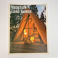 Front cover showing title and A-frame cabin photo