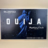 Top of box showing title, artwork and William Fuld credit