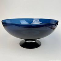 Side profile of cobalt blue pedestal bowl