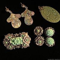 Front view of all jewellery pieces showing design and color