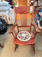 Front view of rocking chair with cushion
