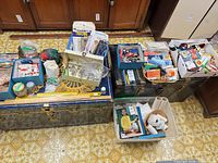 Overall view of boxes and baskets of sewing notions and tools