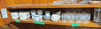 Shelf with full lot: mugs, Cane Art China cups and saucers, Sadler cream and sugar, etched tumblers
