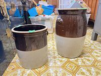 Both crocks side by side showing size difference and two-tone glaze